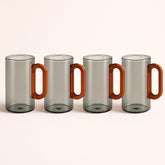 Conjunto de Copos de Vidro Fumê com Alça de Madeira 4 Peças 360ml Conjunto de Copos de Vidro Fumê com Alça de Madeira 4 Peças 360ml Doca