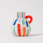 Vaso de Cerâmica Pintado à Mão com Alças Coloridas Vaso de Cerâmica Pintado à Mão com Alças Coloridas Doca Uma alça com traços